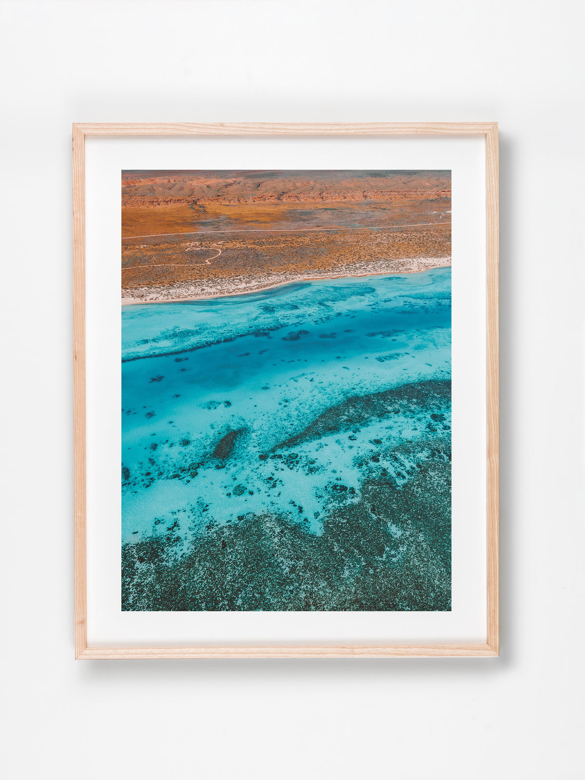 Osprey Bay, Exmouth, Ningaloo, WA. Aerial photography print by Salty Wings in a Raw Oak Deep Set Frame, portrait (SW2312)