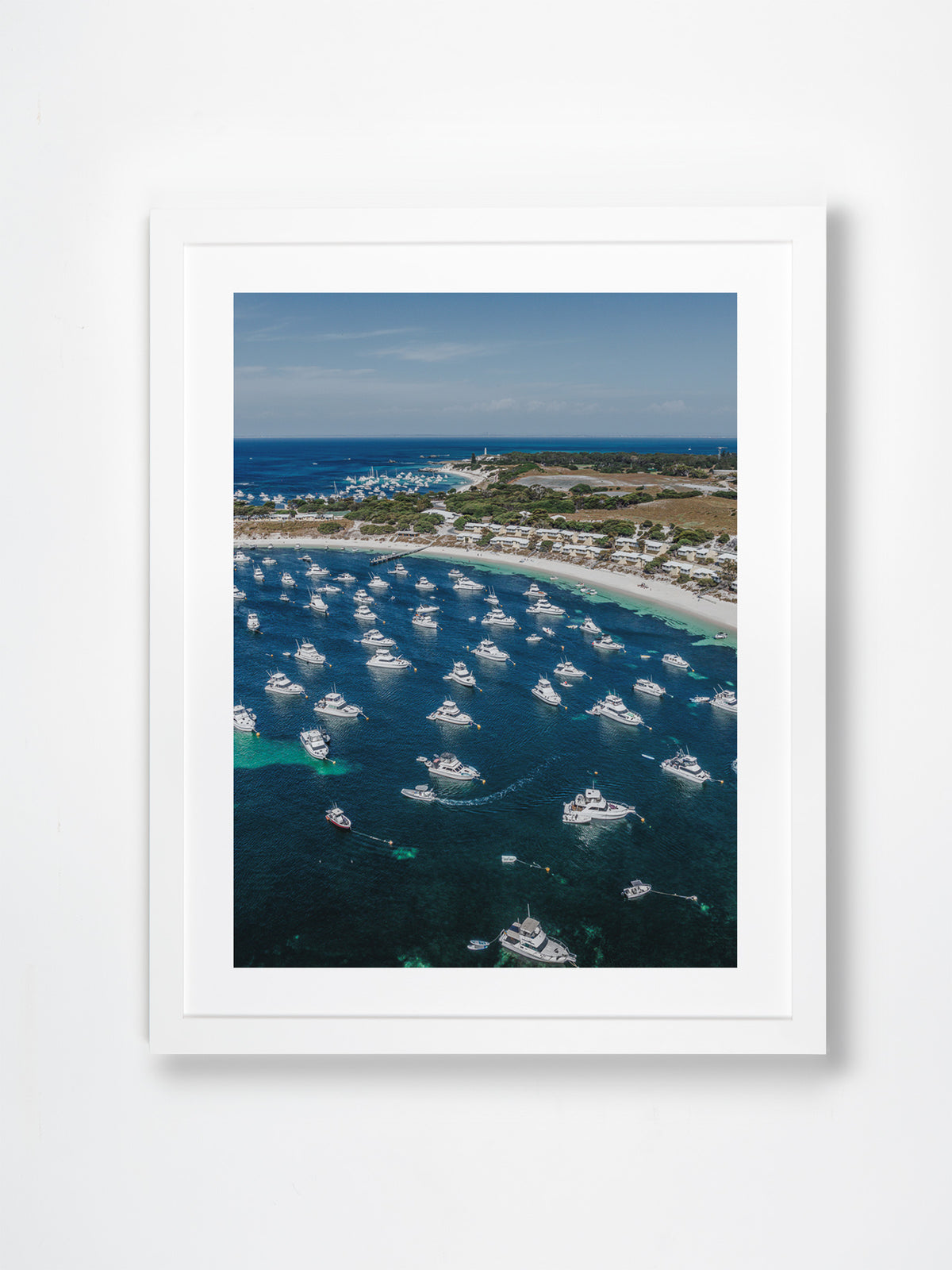 Geordie Bay, Rottnest Island, Perth, WA. Aerial photography print by Salty Wings in a white Classic Frame, portrait (SW2439)