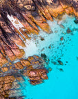 Meelup, Dunsborough, South Western Australia. Clean blue water and orange rocks.